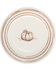 Round paper plate with brown pumpkin design and decorative edge on a white background