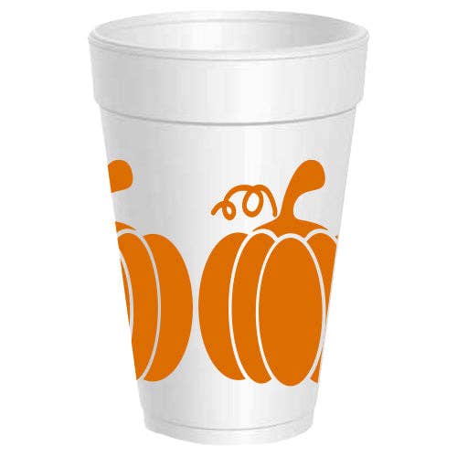 A white disposable foam cup featuring a bold orange pumpkin graphic printed on the side, set against a plain white background.