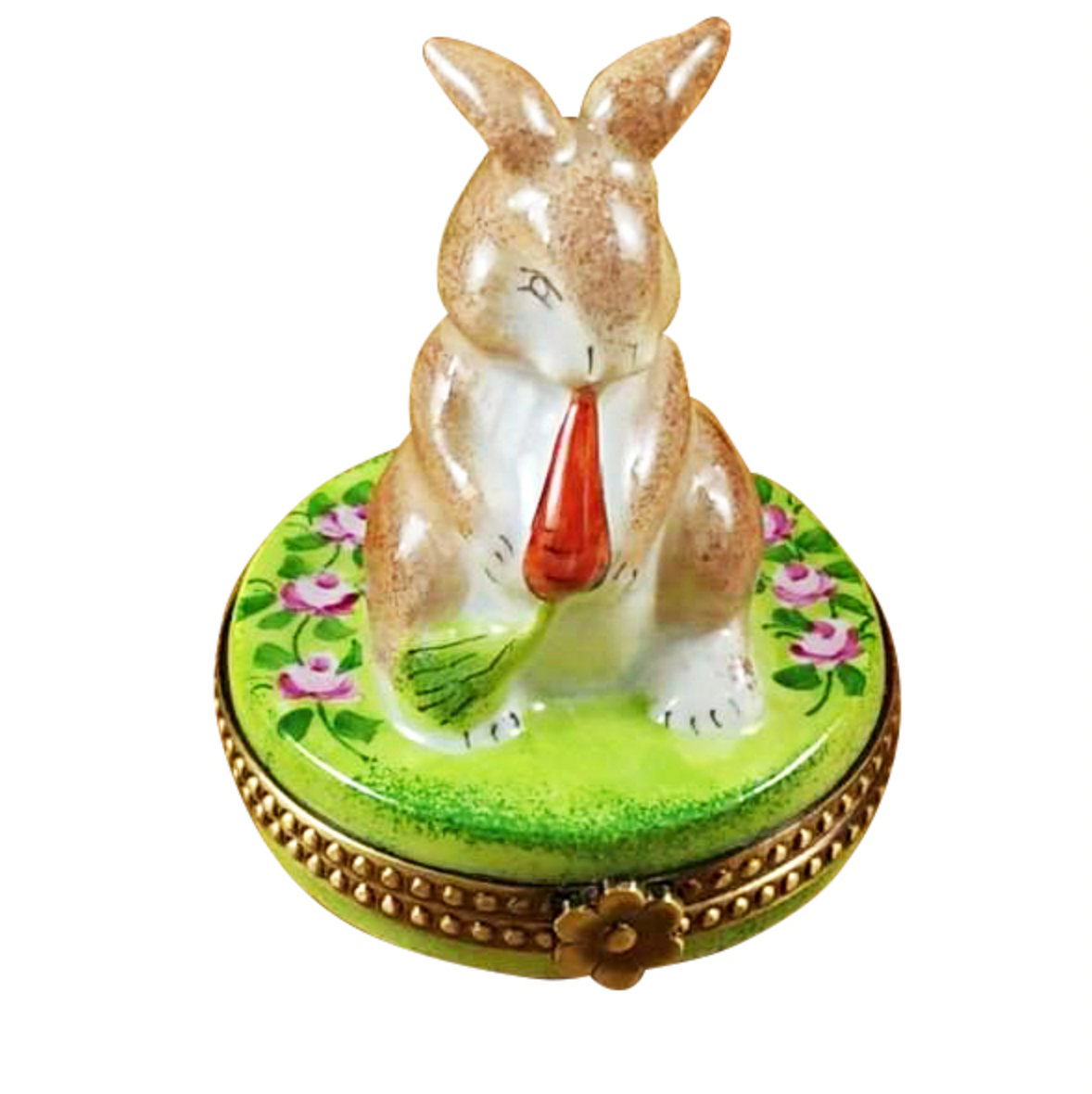 Decorative rabbit figurine on a green base with floral patterns