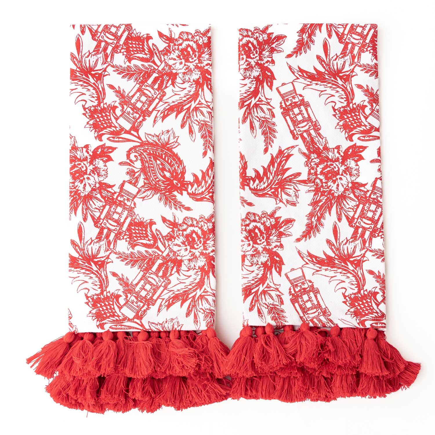 Red and white patterned scarf with tassels on a white background