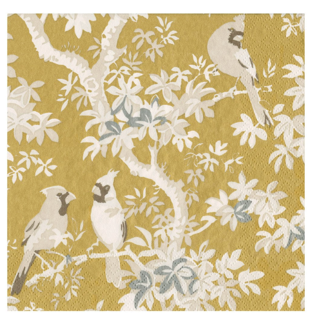 A square decorative paper dinner napkin featuring two white birds perched among white and pale blue leaves on a mustard yellow background.