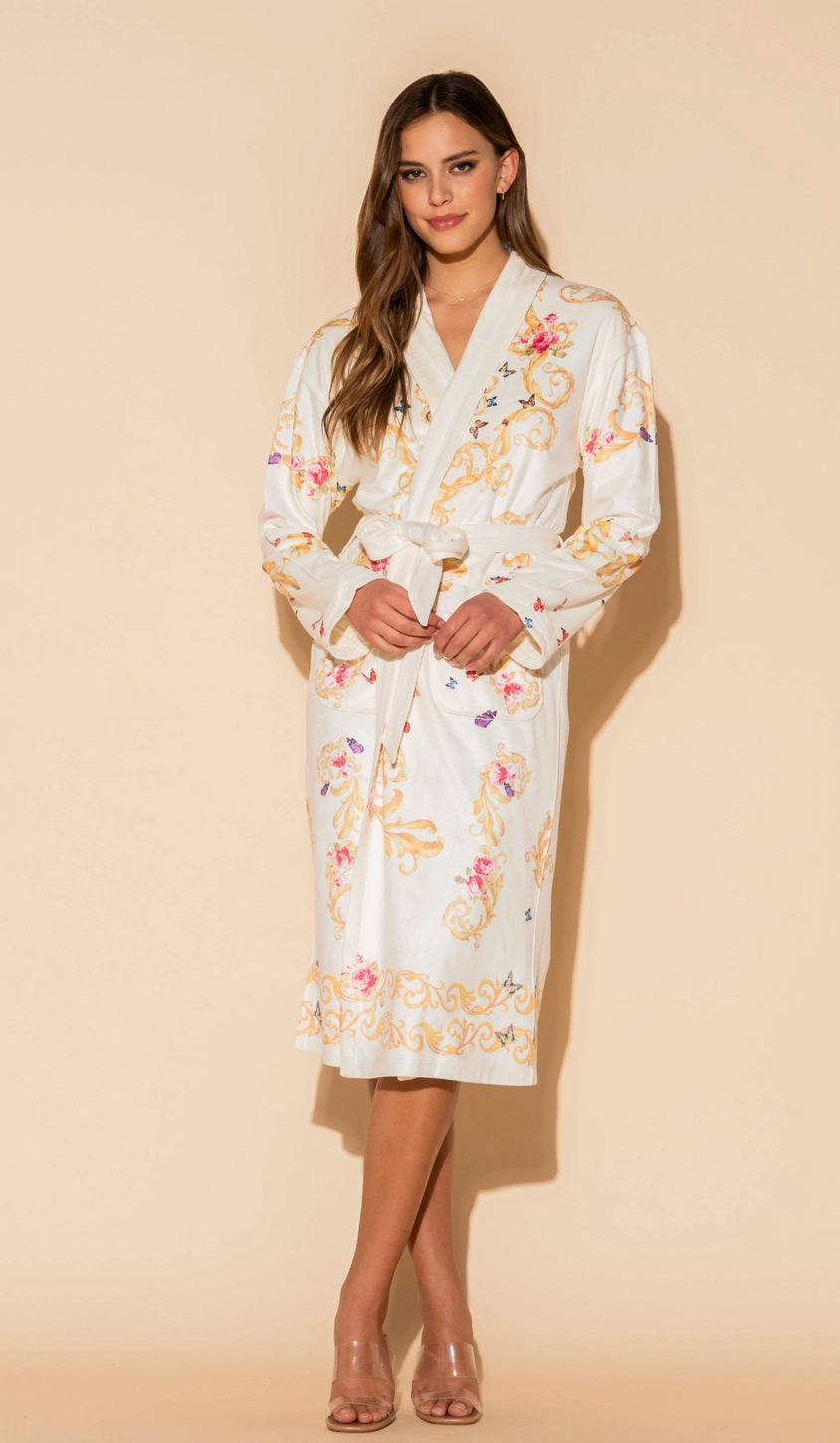 Woman wearing a floral robe against a beige background