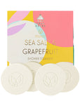 Sea Salt & Grapefruit shower steamers with colorful packaging on a white background