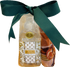 A bundled gift set containing a clear plastic-wrapped spiced pumpkin hand soap and a fall colored hand towel. 