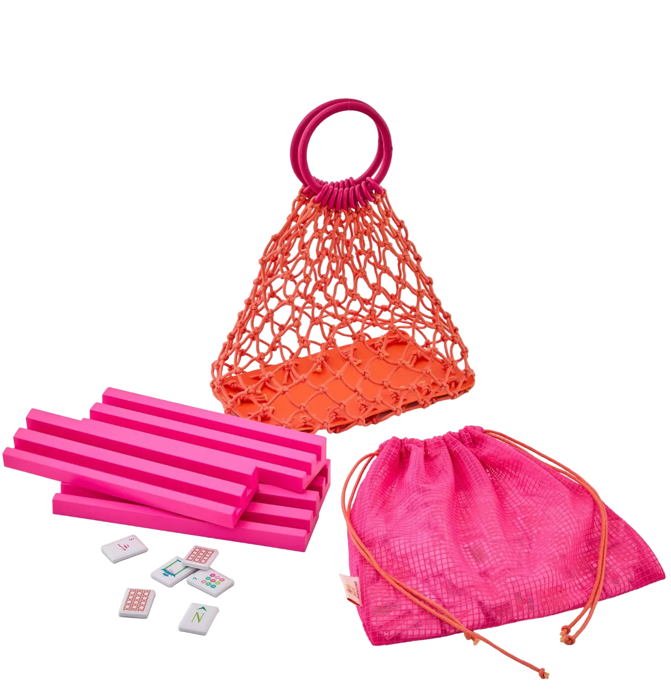Pink and orange Mahjong set with sticks, dice, and bags on a white background