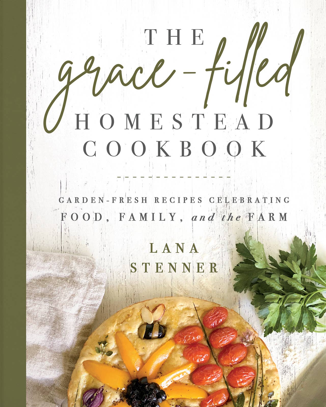 Cover of 'The grace-filled homestead cookbook' featuring a colorful dish with fruits and vegetables, and the author's name, Lana Stenner, displayed at the top.