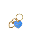Gold and blue keychain with heart design on a white background