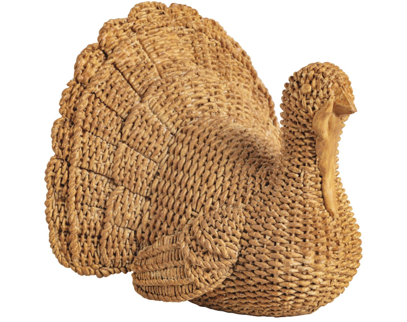 A decorative woven resin turkey figurine with a textured, handwoven appearance, shown against a plain white background.