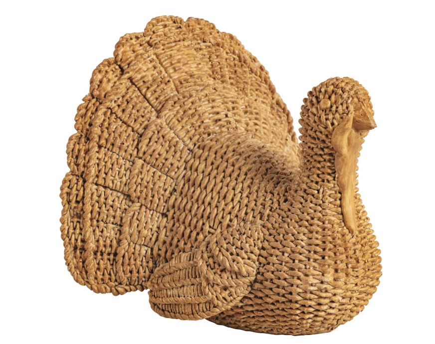 A decorative woven resin turkey figurine with a textured, handwoven appearance, shown against a plain white background.