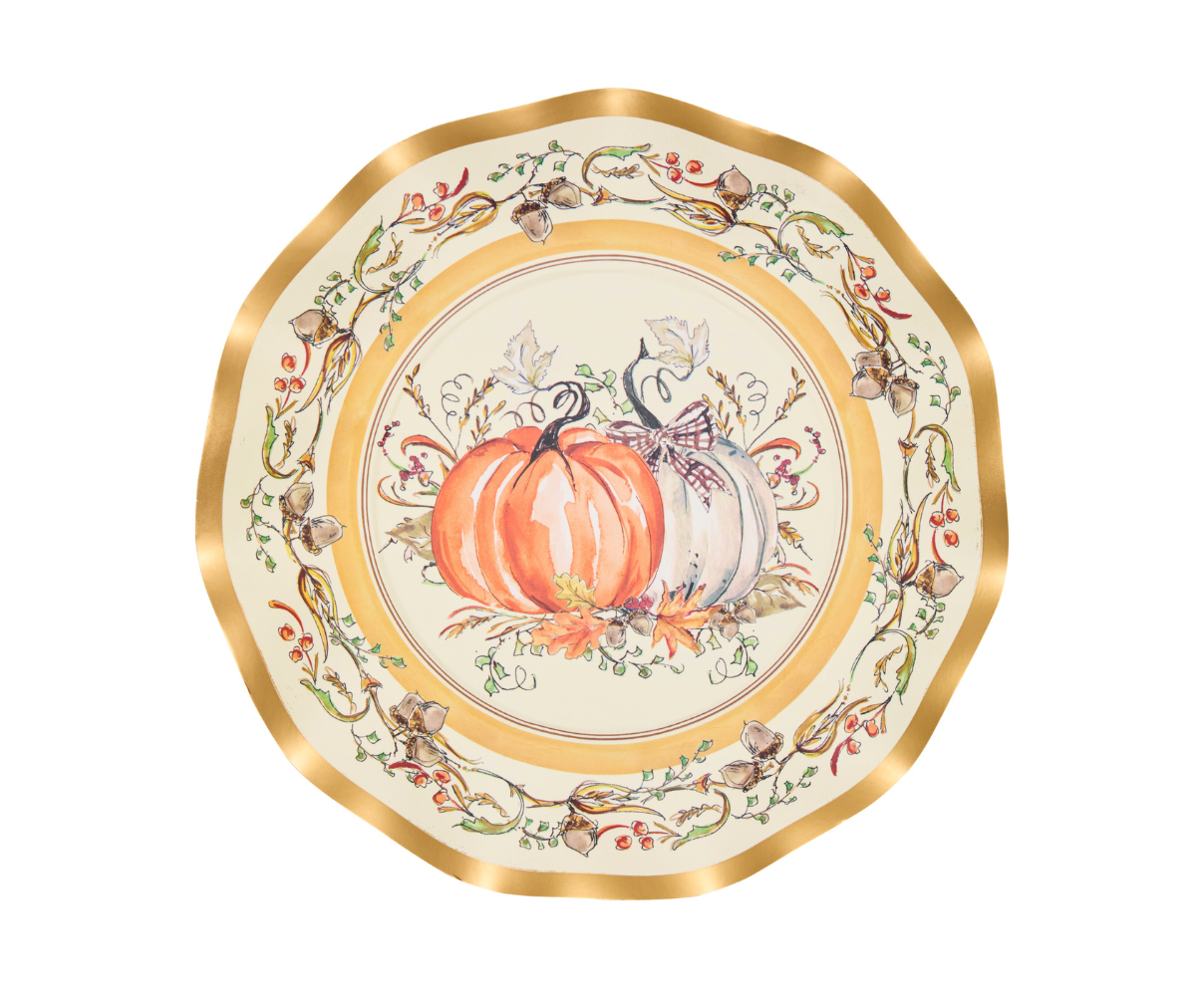 Decorative plate with pumpkins and floral patterns on a white background