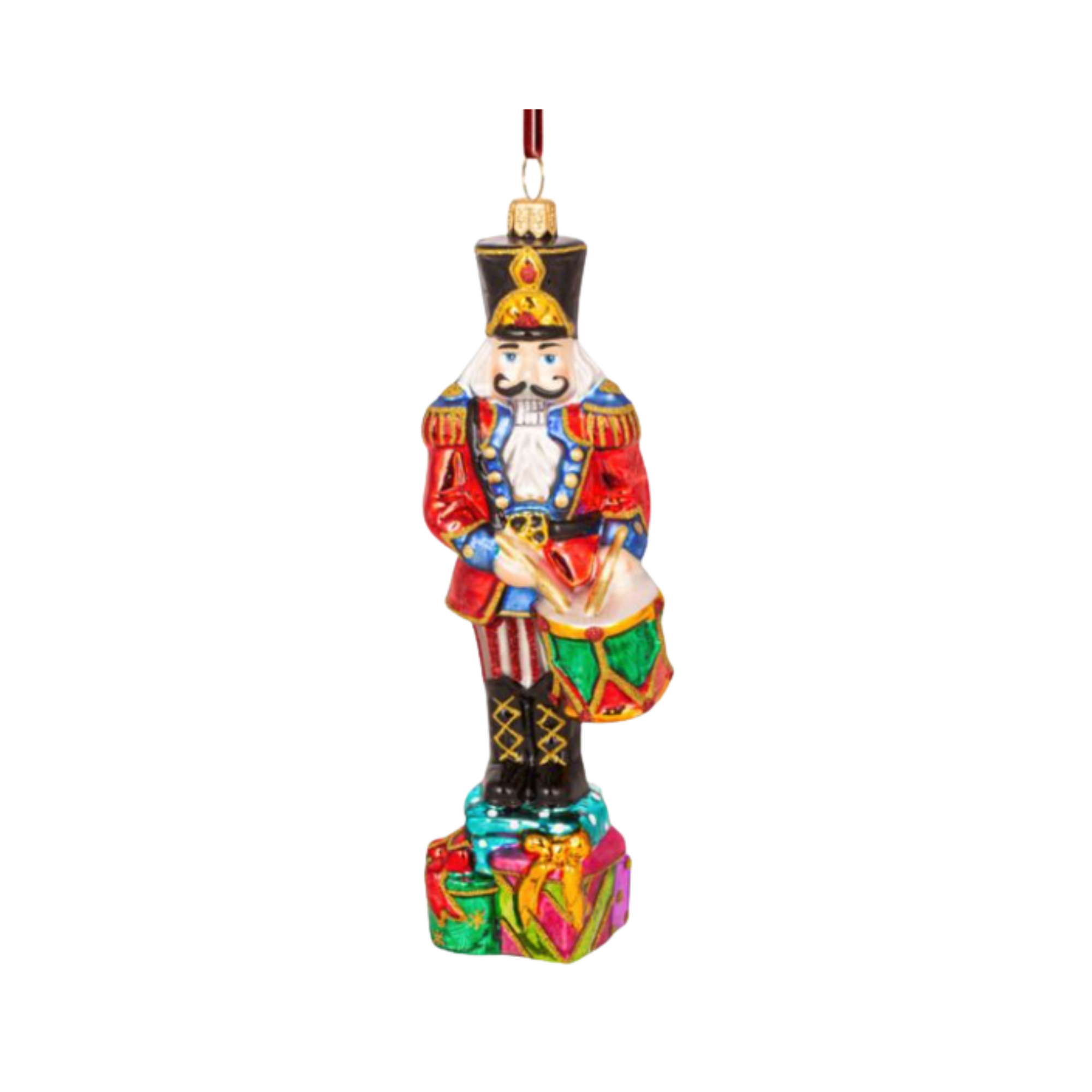 Colorful Nutcracker Christmas ornament on a white background