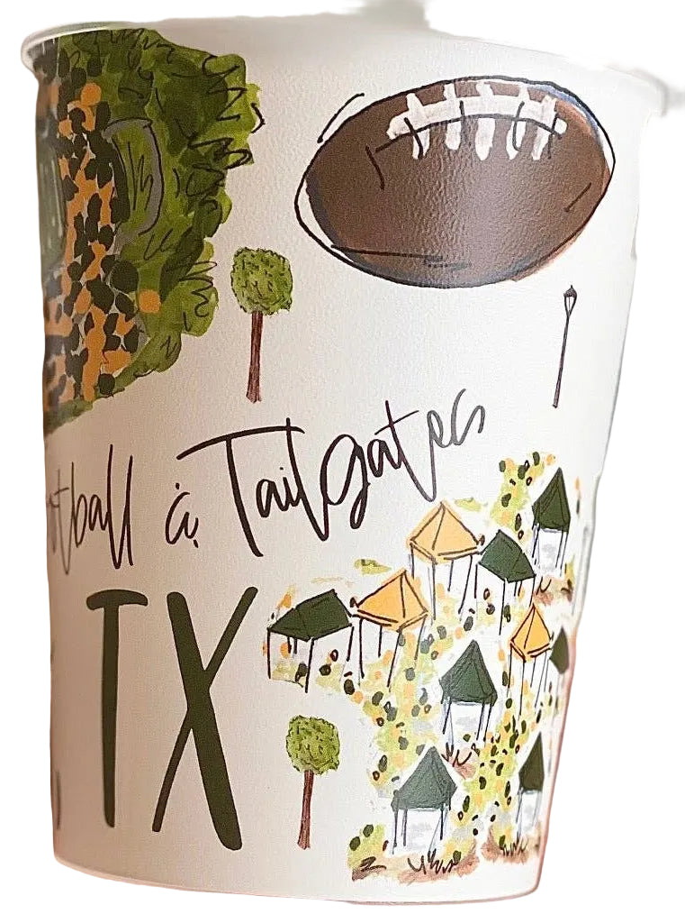 A white insulated coffee cup featuring a hand-painted style illustration of a football, trees, tents.