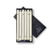 A set of twelve ivory unscented taper candles presented in a box with a black interior and a branded cardboard header.