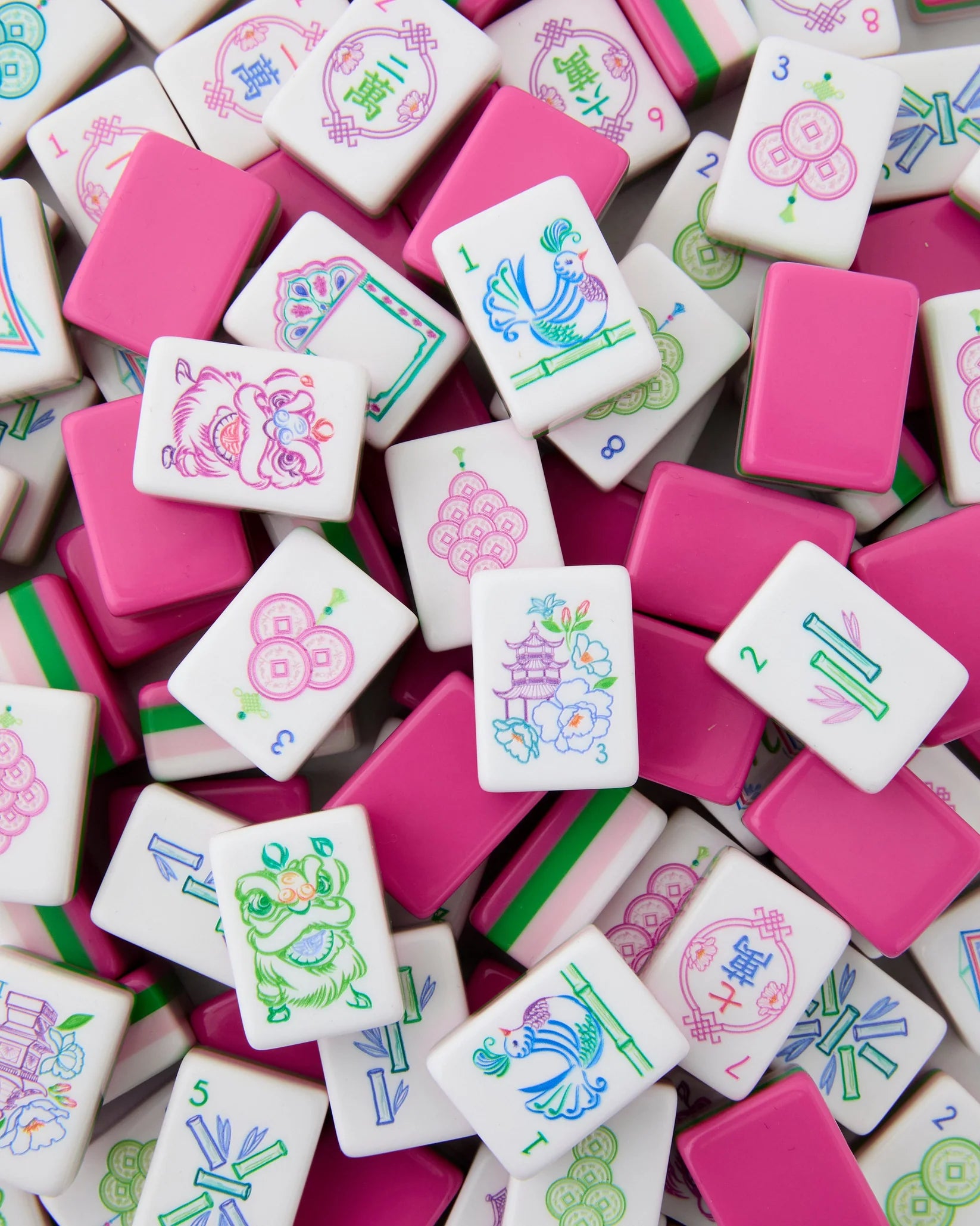 Amara Mahjong tiles in pink and green.