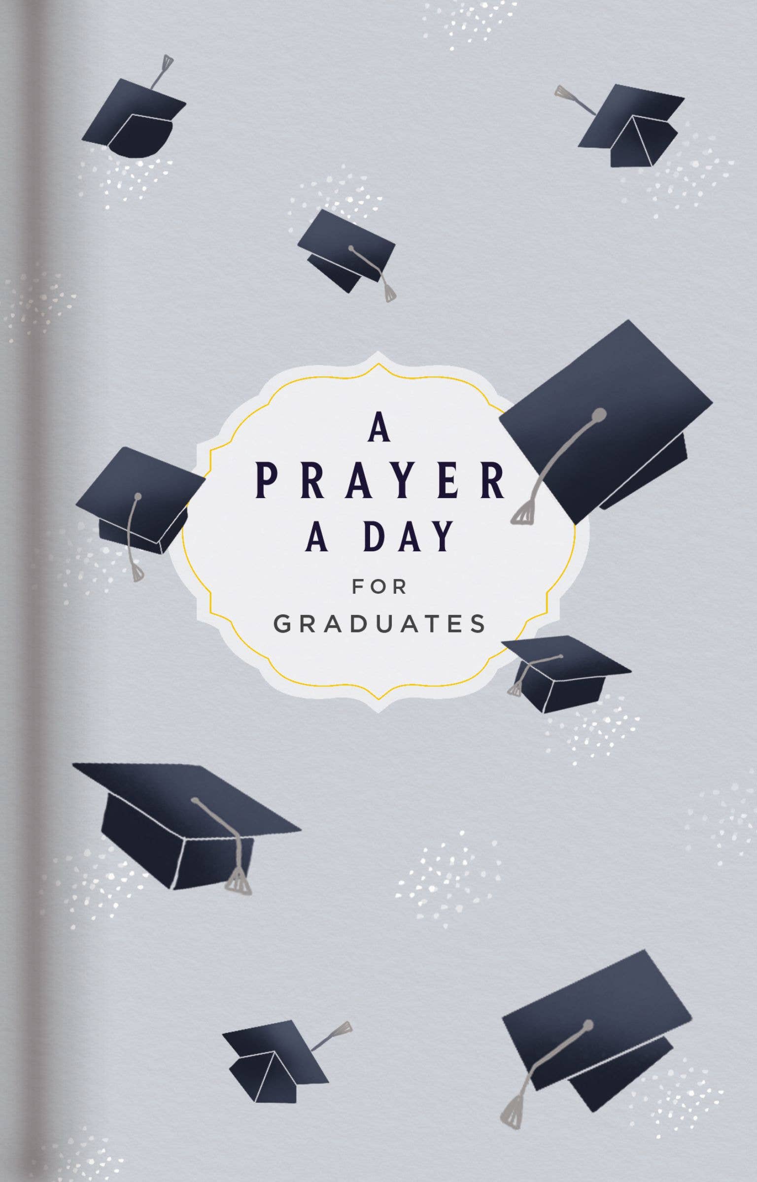 Book cover with graduation caps and 'A Prayer a Day for Graduates' text on a light gray background
