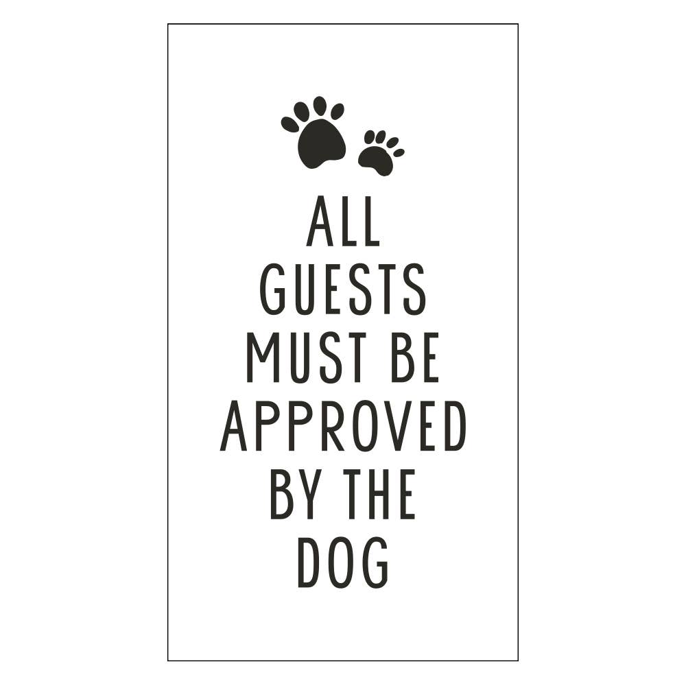 Paper napkin with text 'All guests must be approved by the dog' and paw prints on a white background
