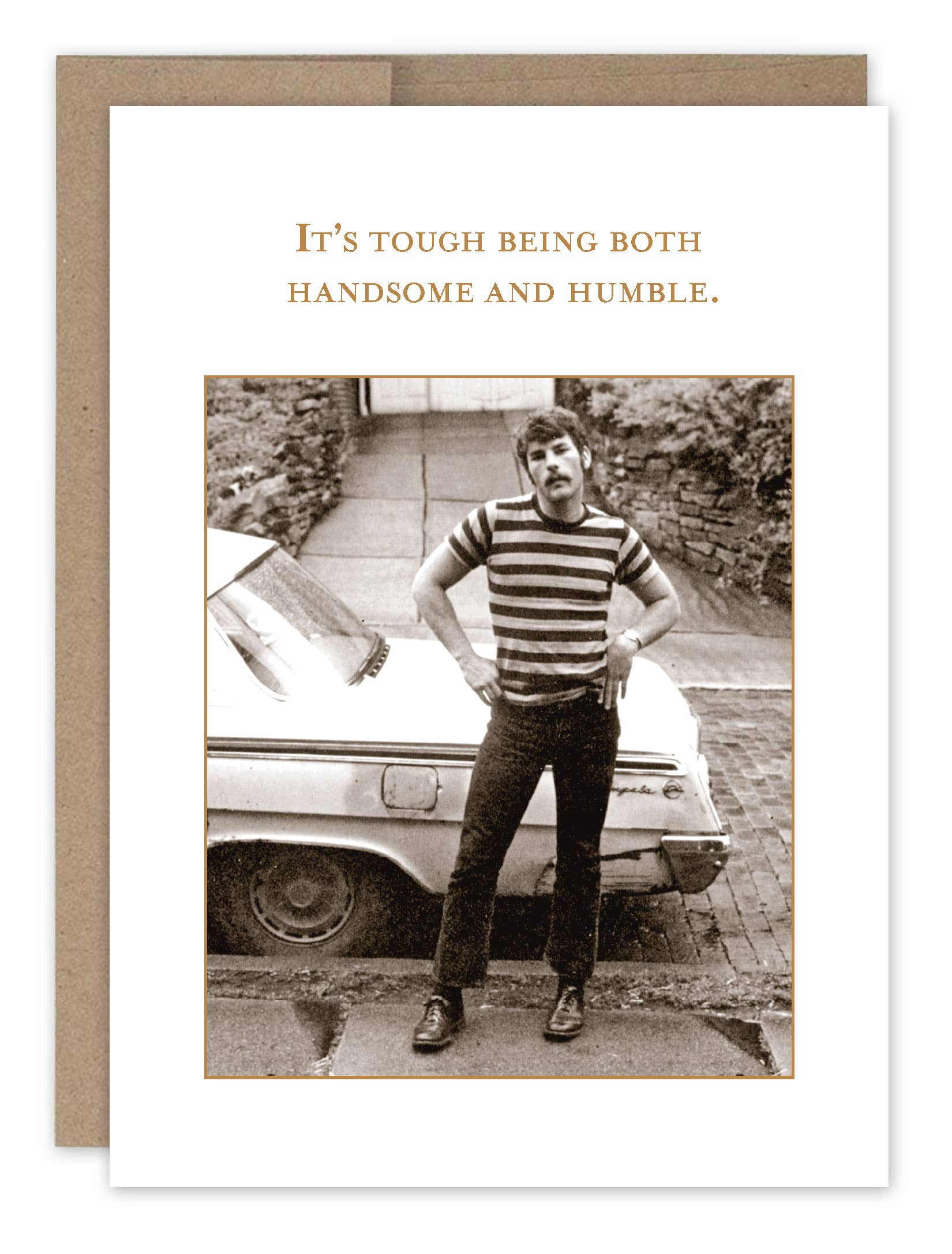 Greeting card with a black and white photo of a man standing next to a car, with text 'It's tough being both handsome and humble.'.