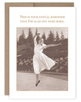 Vintage-style card with a dancer in mid-air and text about being glad someone was born.