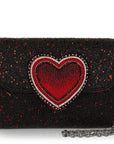 Black beaded clutch with a red heart design on a white background
