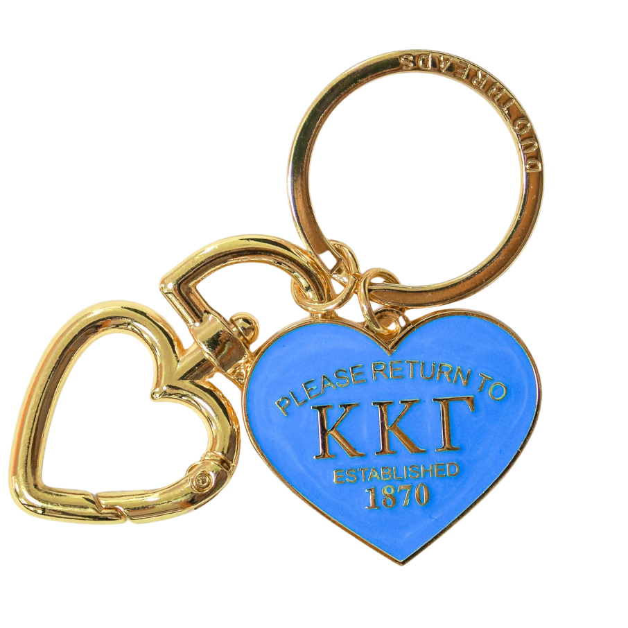 Gold and blue keychain with heart-shaped tag on a white background