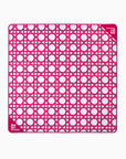Pink and white grid patterned mahjong mat on a white background