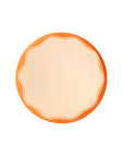 Picture of orange paper plates. 