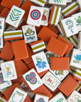 Collection of colorful Mahjong tiles with various symbols and designs.